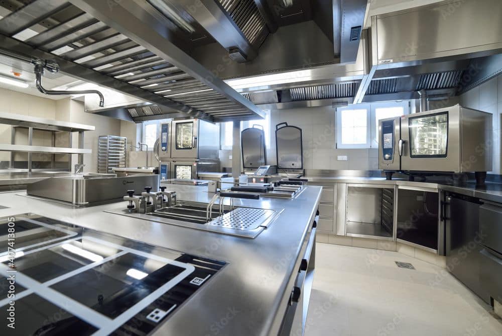 Spotless commercial kitchen in restaurant for pest inspection
