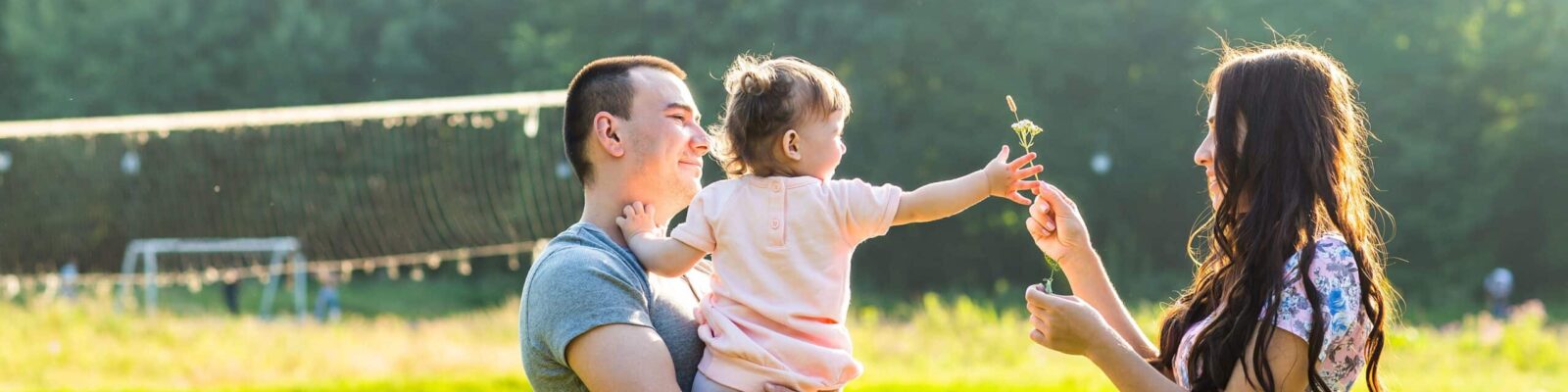 family-summer-yard Family enjoying a pest-free summer yard